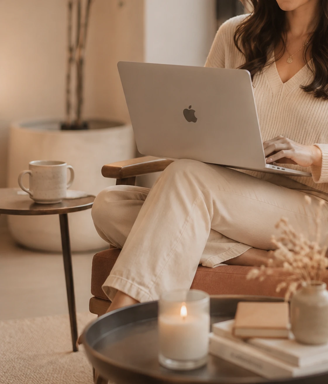 A woman attending a virtual therapy session from home